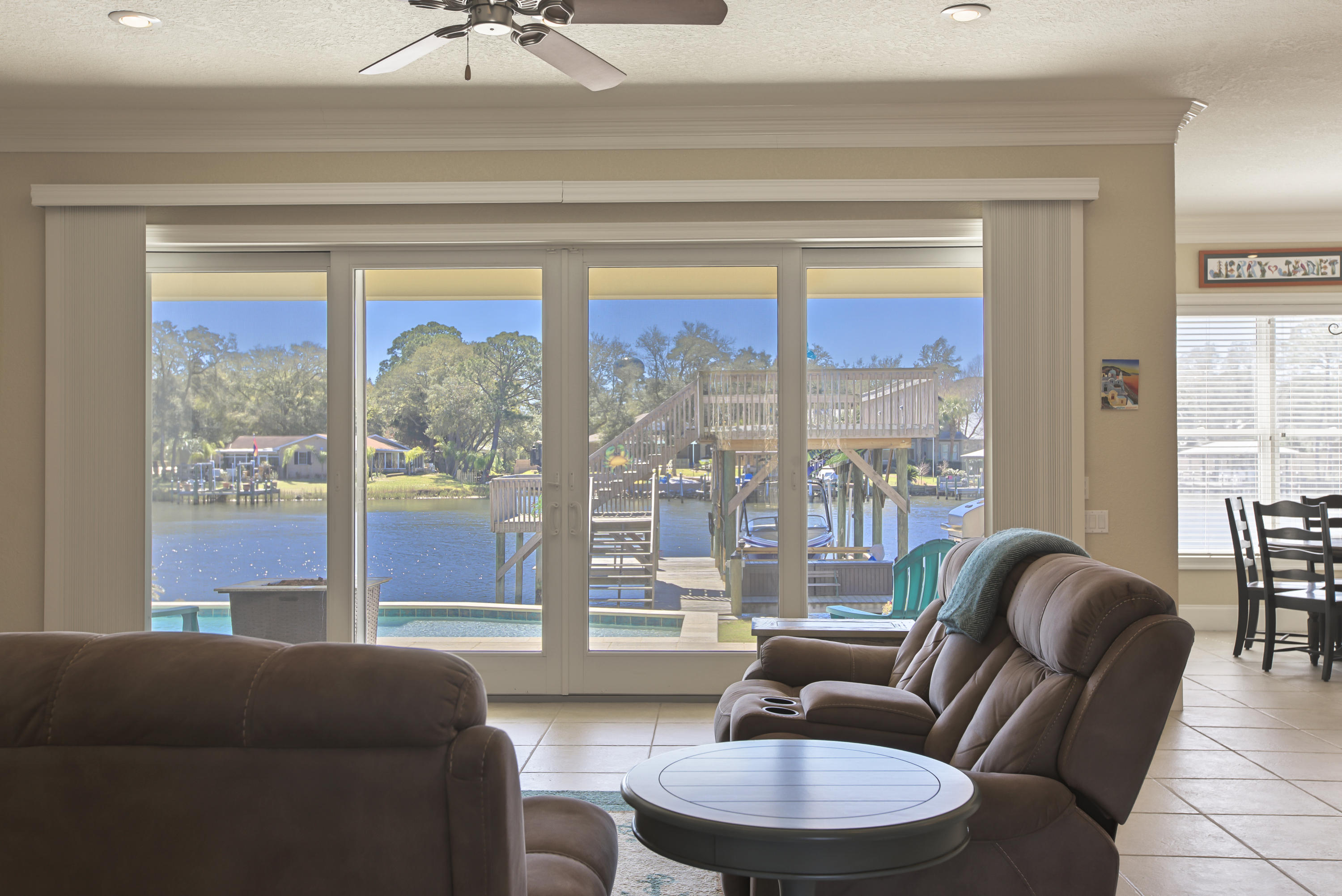 218 Buck Road Santa Rosa Beach, FL 32459 - Photo 5 of 25 a living room with furniture and a large window