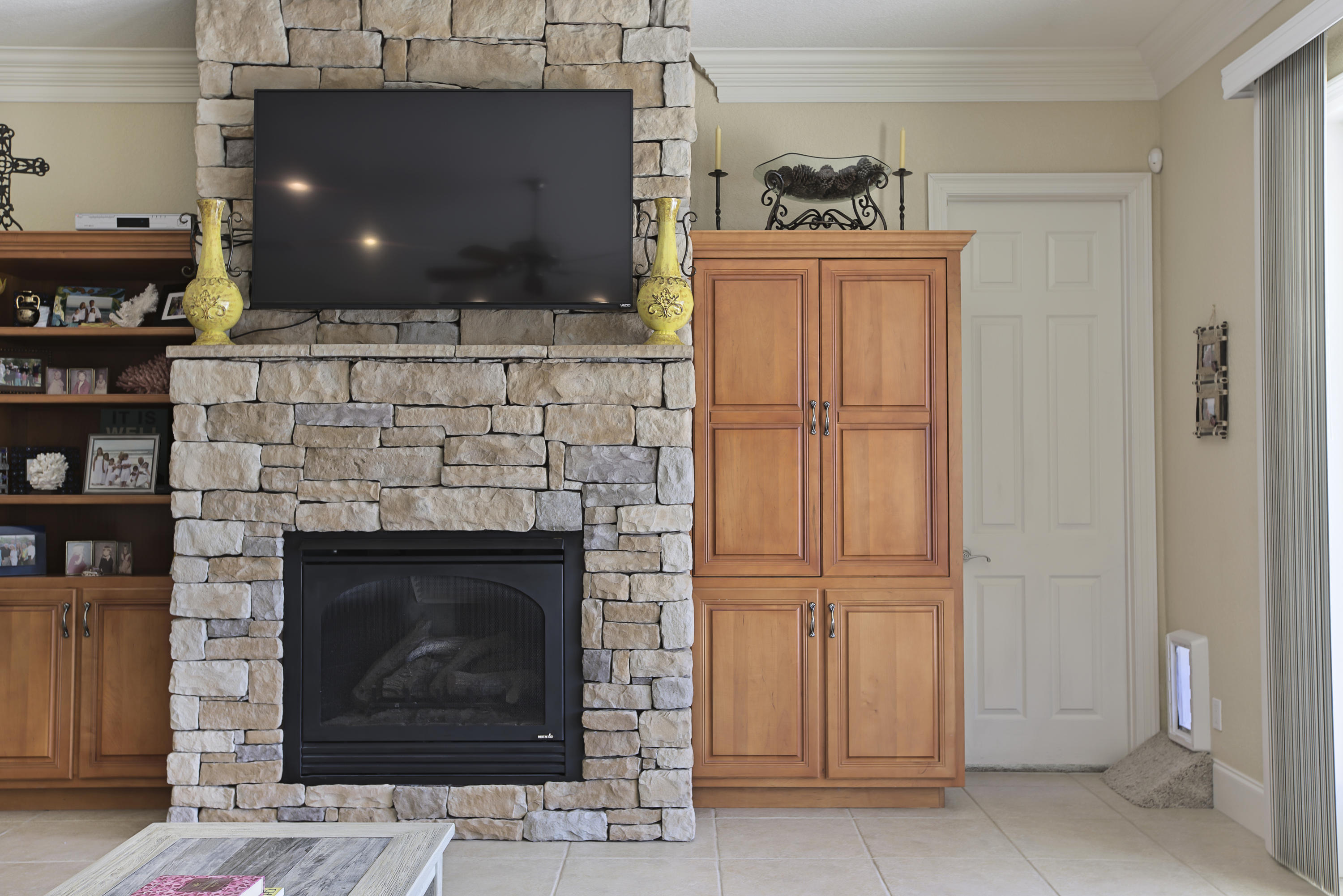 218 Buck Road Santa Rosa Beach, FL 32459 - Photo 6 of 25 a living room with a fireplace
