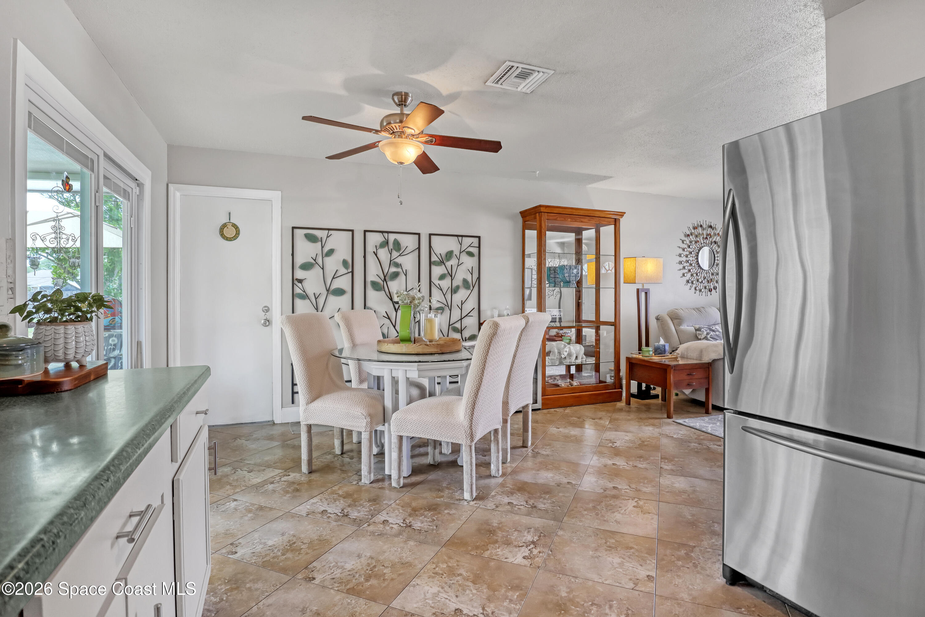 858 Carnival Road Southeast Palm Bay, FL 32909 - Photo 11 of 21 Dining Area From Kitchen