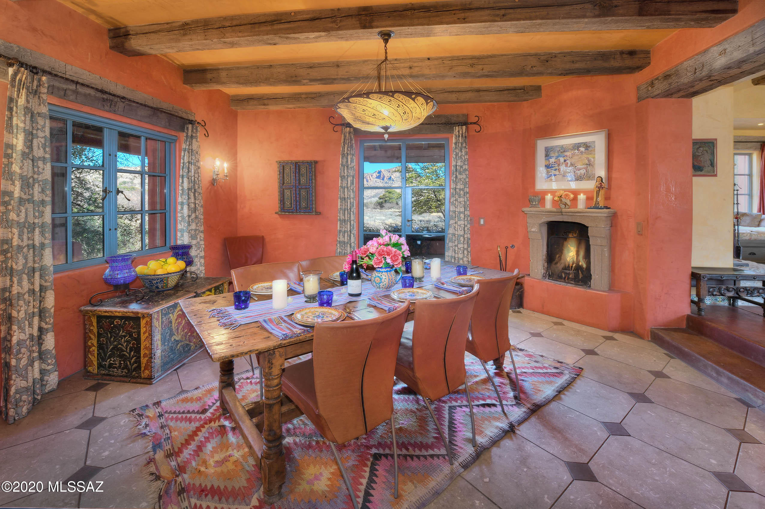 360 Harshaw Creek Road Patagonia, AZ 85624 - Photo 17 of 50 a view of a dining room with furniture window and wooden floor