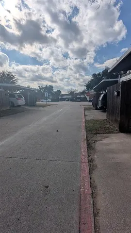 a view of city street with side of street
