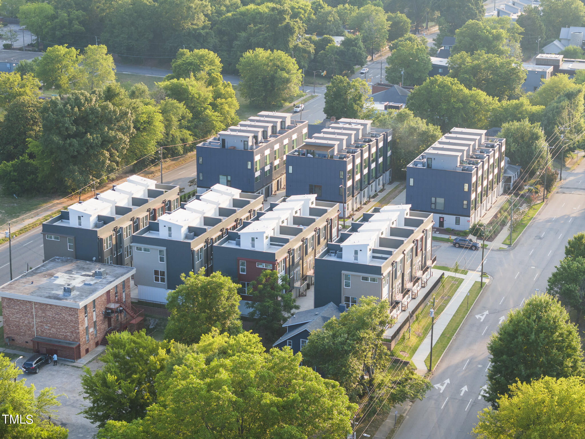 2 Seawell Avenue, Unit 105 Raleigh, NC 27601 - Photo 28 of 40 a view of a houses with city view