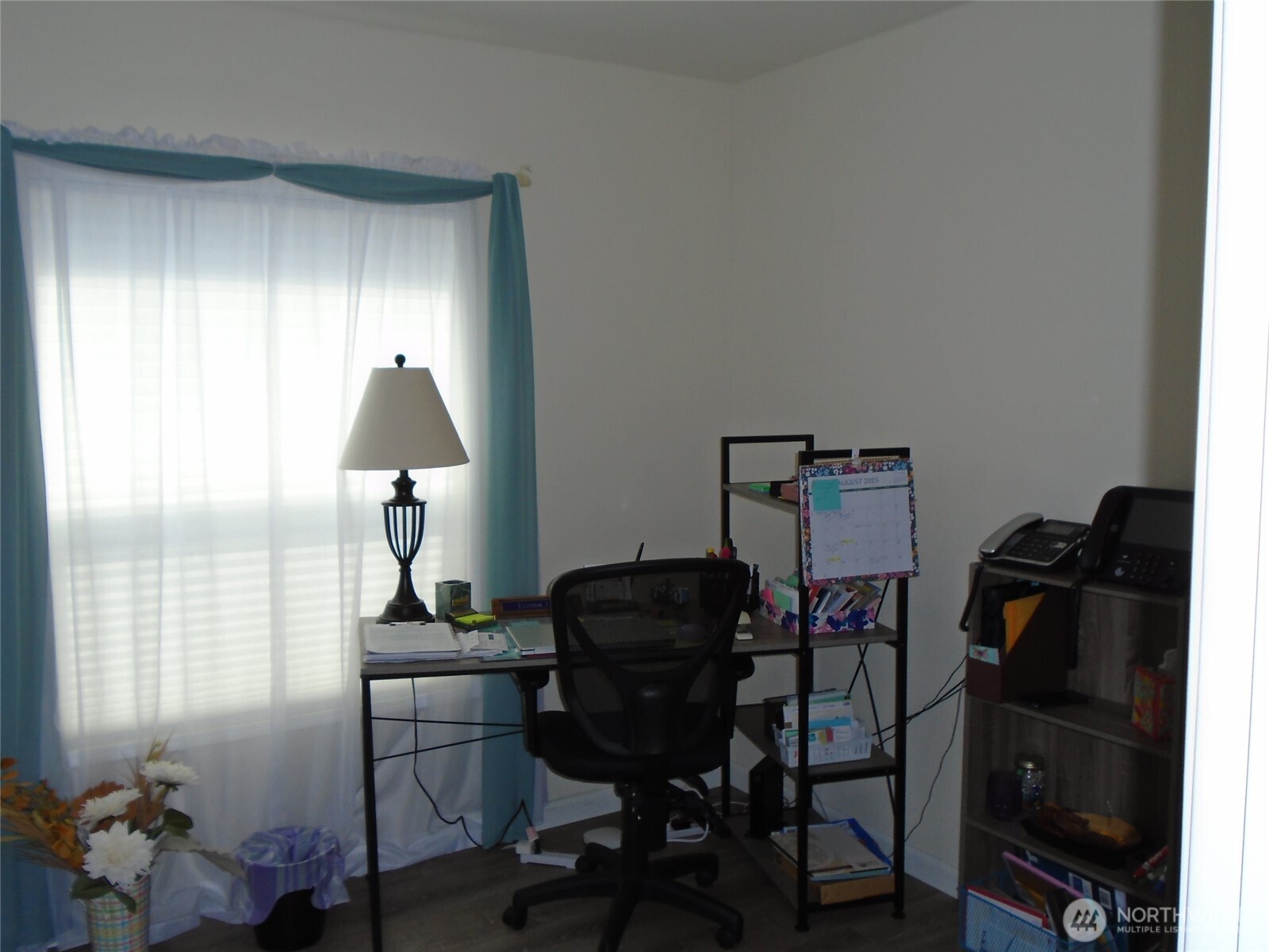894 North Iris Avenue Sequim, WA 98382 - Photo 15 of 38 a view of a workspace with furniture and a window