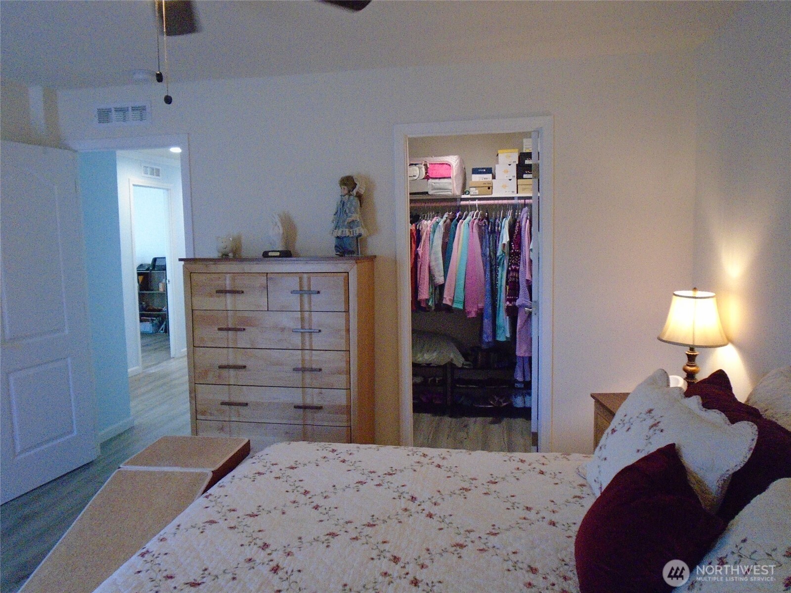 894 North Iris Avenue Sequim, WA 98382 - Photo 18 of 38 a bed room with a bed and a closet