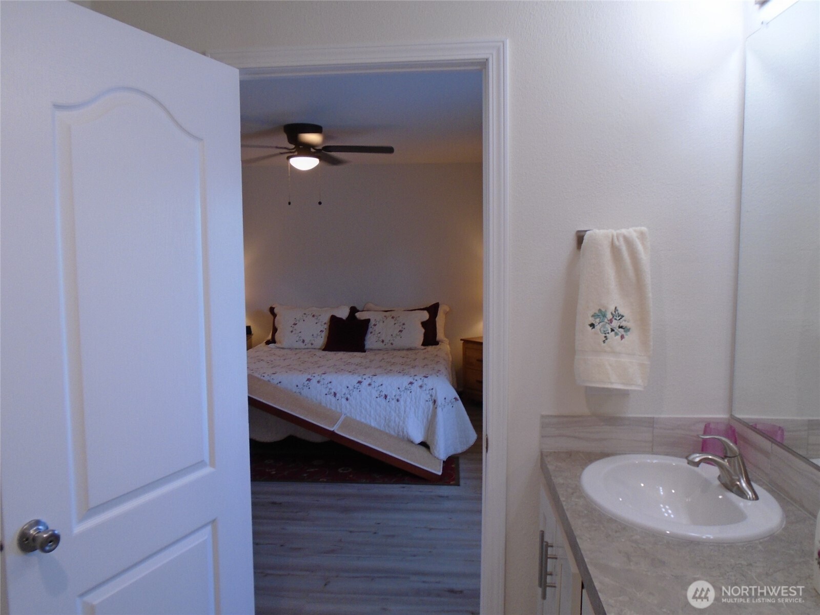 894 North Iris Avenue Sequim, WA 98382 - Photo 21 of 38 a bathroom with a sink and a mirror