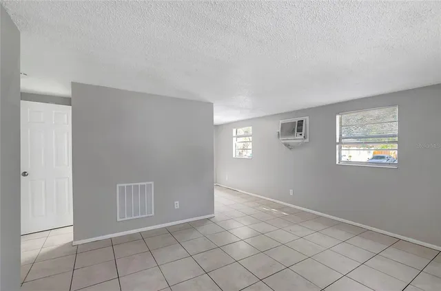 a view of an empty room with window