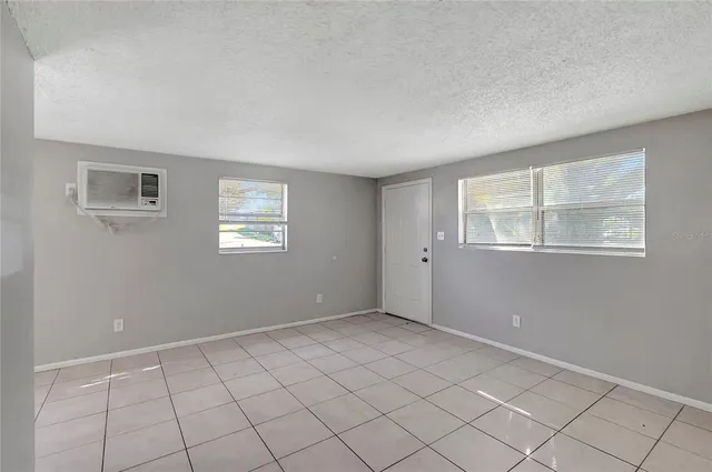 a view of an empty room with window