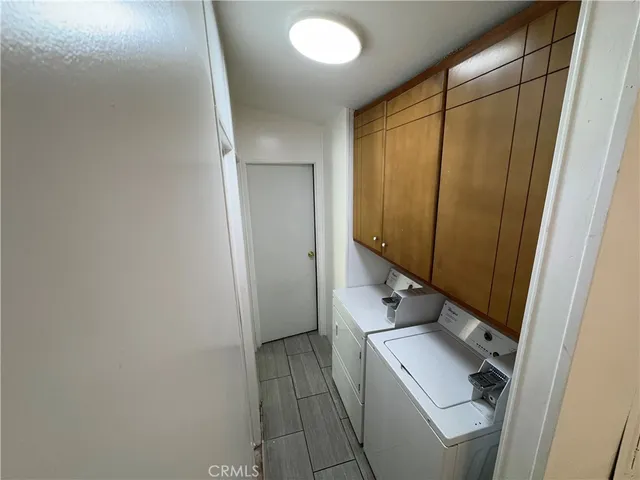 a bathroom with a shower and toilet