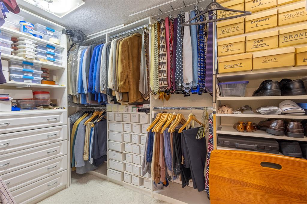 2000 South Ocean Boulevard, Unit 10E Lauderdale-by-the-Sea, FL 33062 - Photo 34 of 86 a view of walk in closet with clothes and shoes