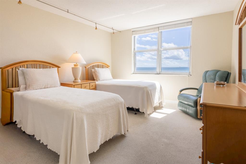 2000 South Ocean Boulevard, Unit 10E Lauderdale-by-the-Sea, FL 33062 - Photo 39 of 86 a bedroom with bed and window