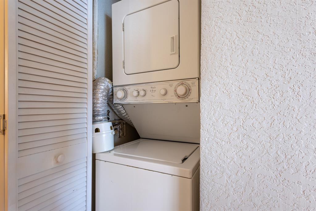2000 South Ocean Boulevard, Unit 10E Lauderdale-by-the-Sea, FL 33062 - Photo 43 of 86 a utility room with dryer and washer