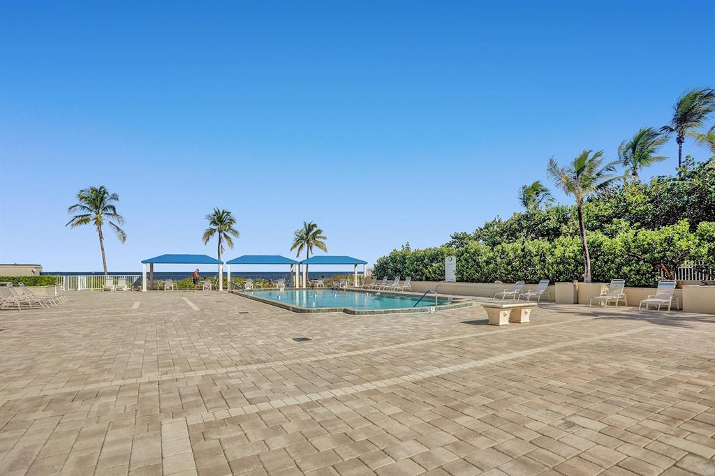 2000 South Ocean Boulevard, Unit 10E Lauderdale-by-the-Sea, FL 33062 - Photo 51 of 86 a view of a swimming pool and an outdoor space