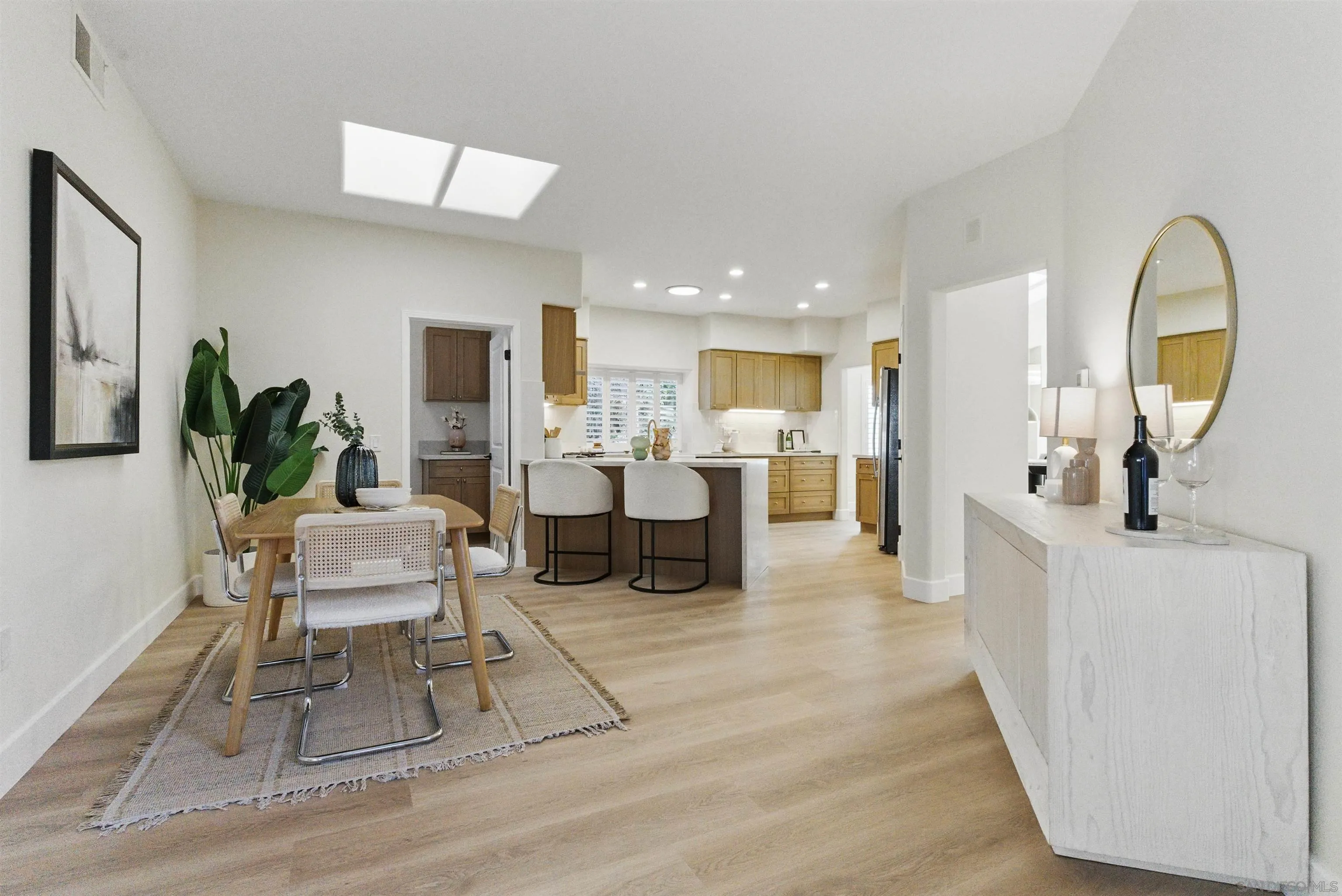 4140 Andros Way Oceanside, CA 92056 - Photo 15 of 41 a living room with furniture and a mirror