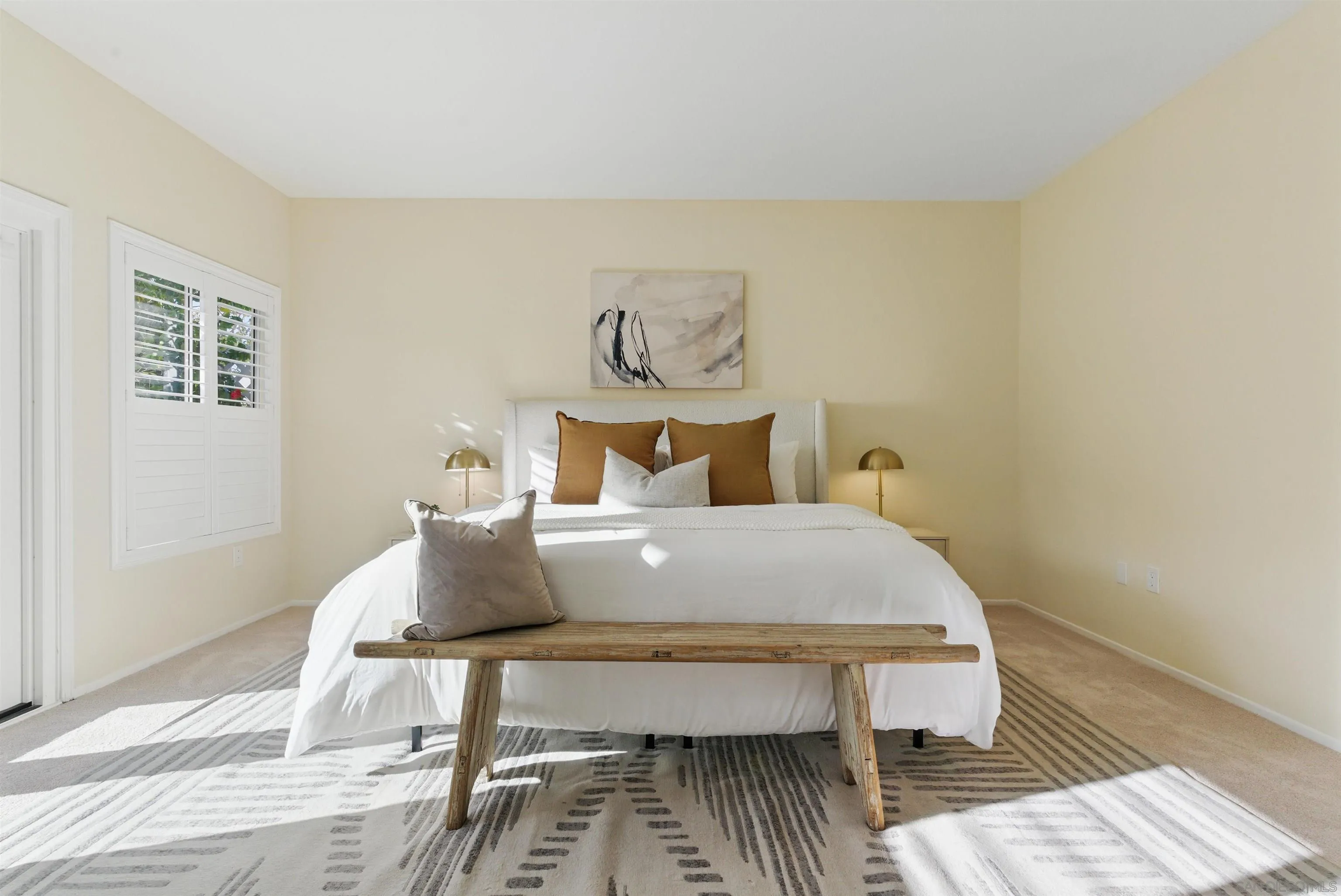 4140 Andros Way Oceanside, CA 92056 - Photo 18 of 41 a bedroom with a bed and wooden floor