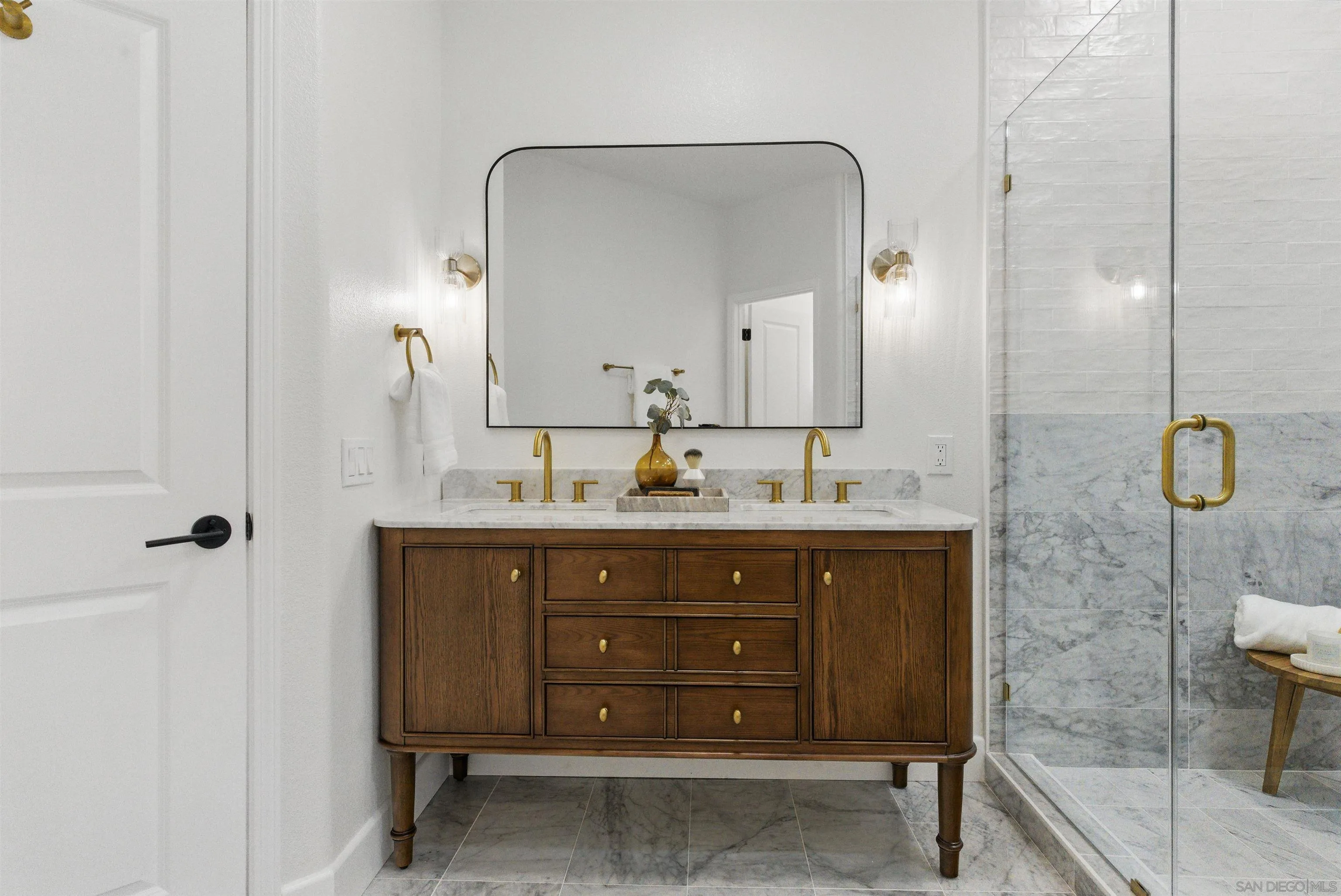 4140 Andros Way Oceanside, CA 92056 - Photo 20 of 41 a bathroom with a granite countertop sink mirror and double