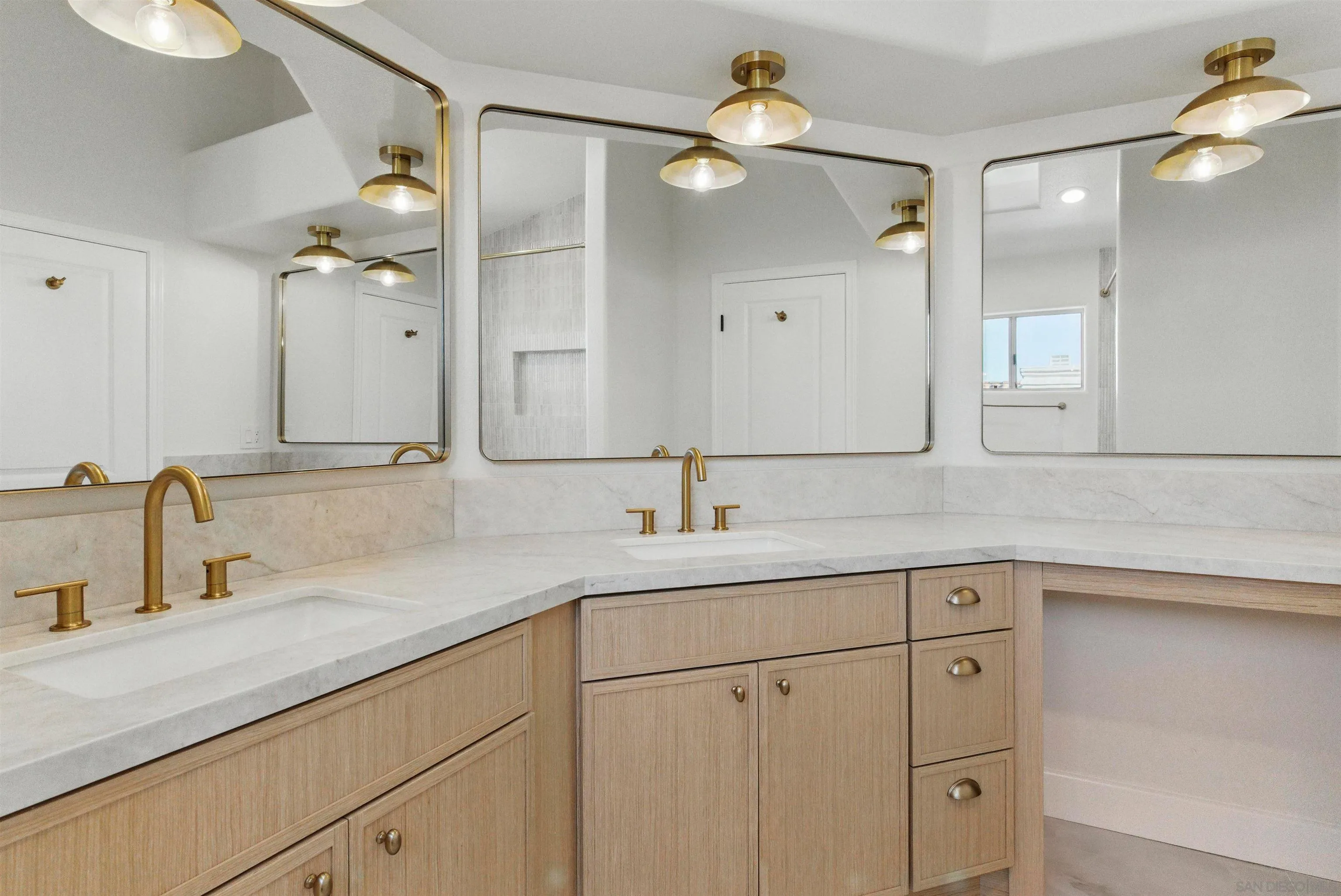 4140 Andros Way Oceanside, CA 92056 - Photo 26 of 41 a bathroom with a sink vanity and a mirror