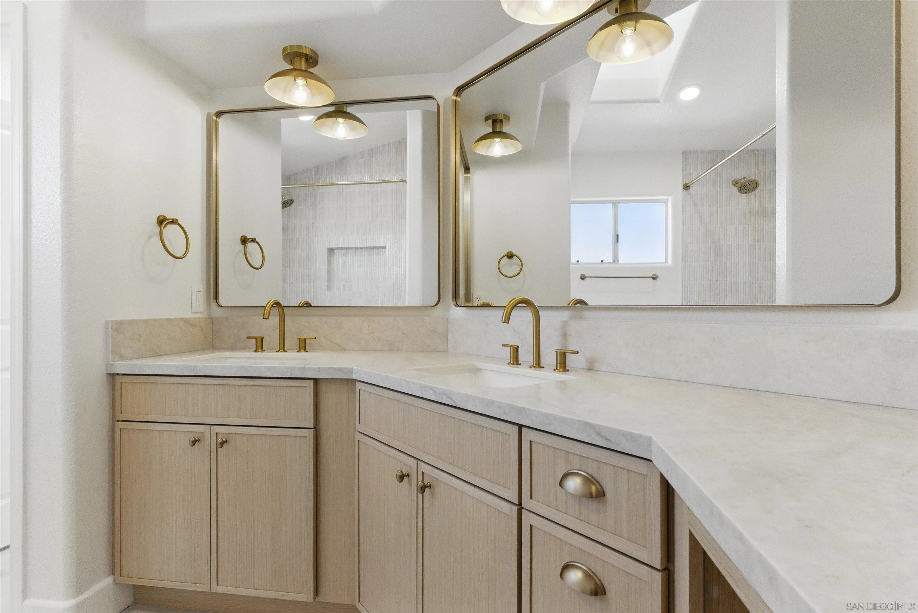 4140 Andros Way Oceanside, CA 92056 - Photo 27 of 41 a bathroom with a sink and a mirror