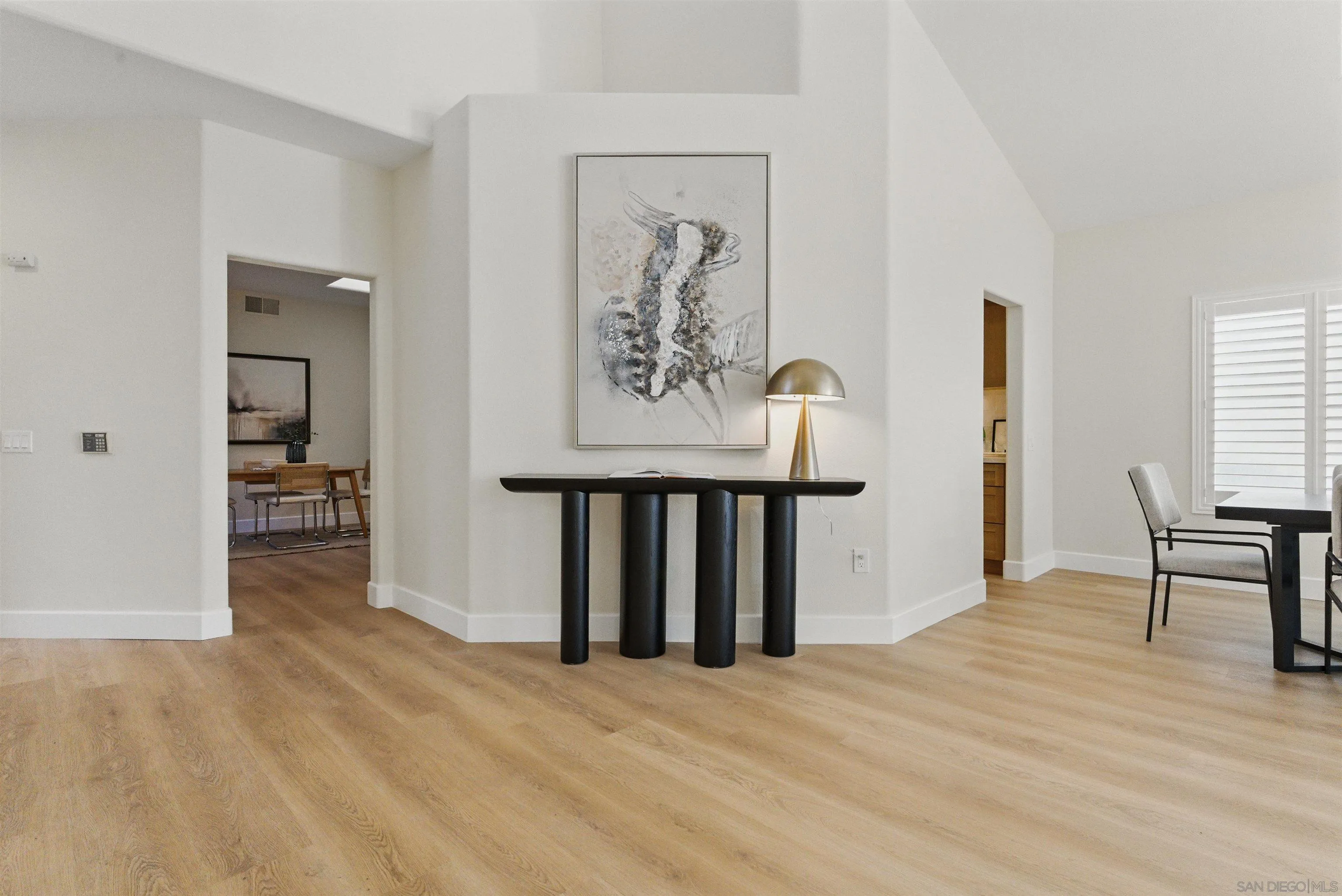 4140 Andros Way Oceanside, CA 92056 - Photo 9 of 41 a view of a livingroom with wooden floor and a window