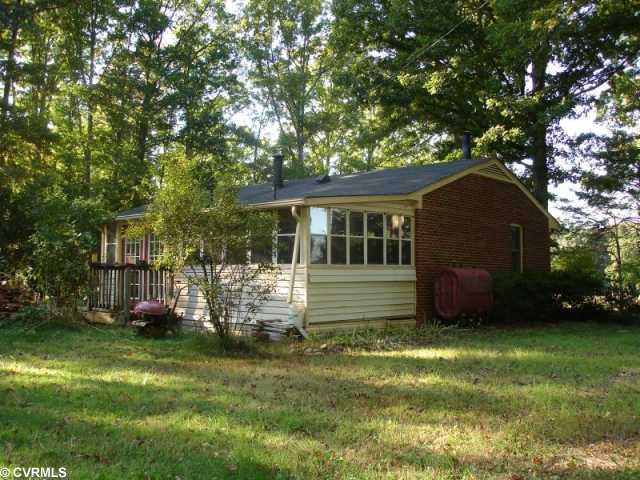 2319 Three Bridge Road Powhatan, VA 23139 - Photo 3 of 9 Exterior Front - Back yard with lots of room for gardening.