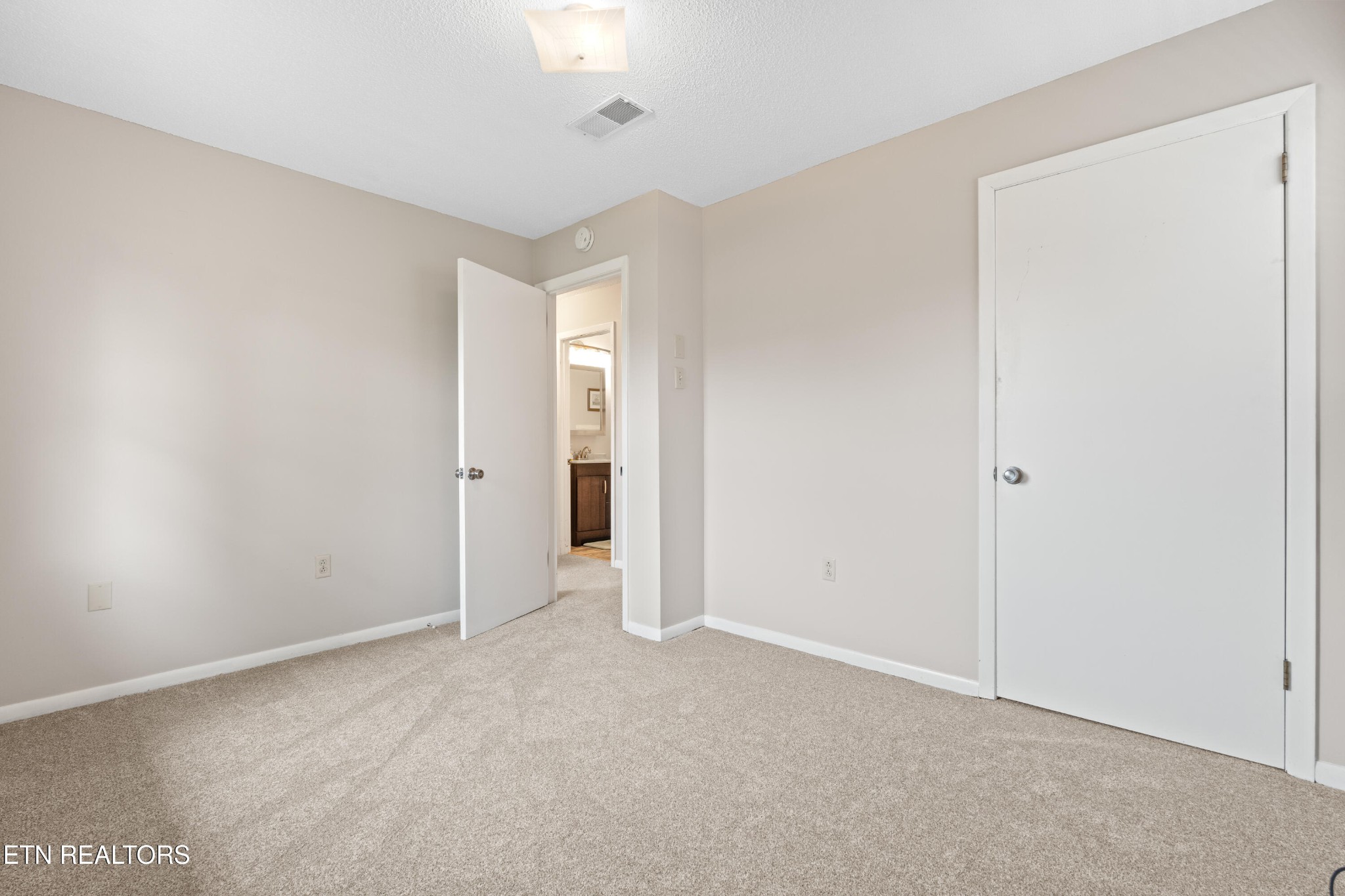325 Blue Ridge Lane Seymour, TN 37865 - Photo 12 of 27 an empty room with an entryway