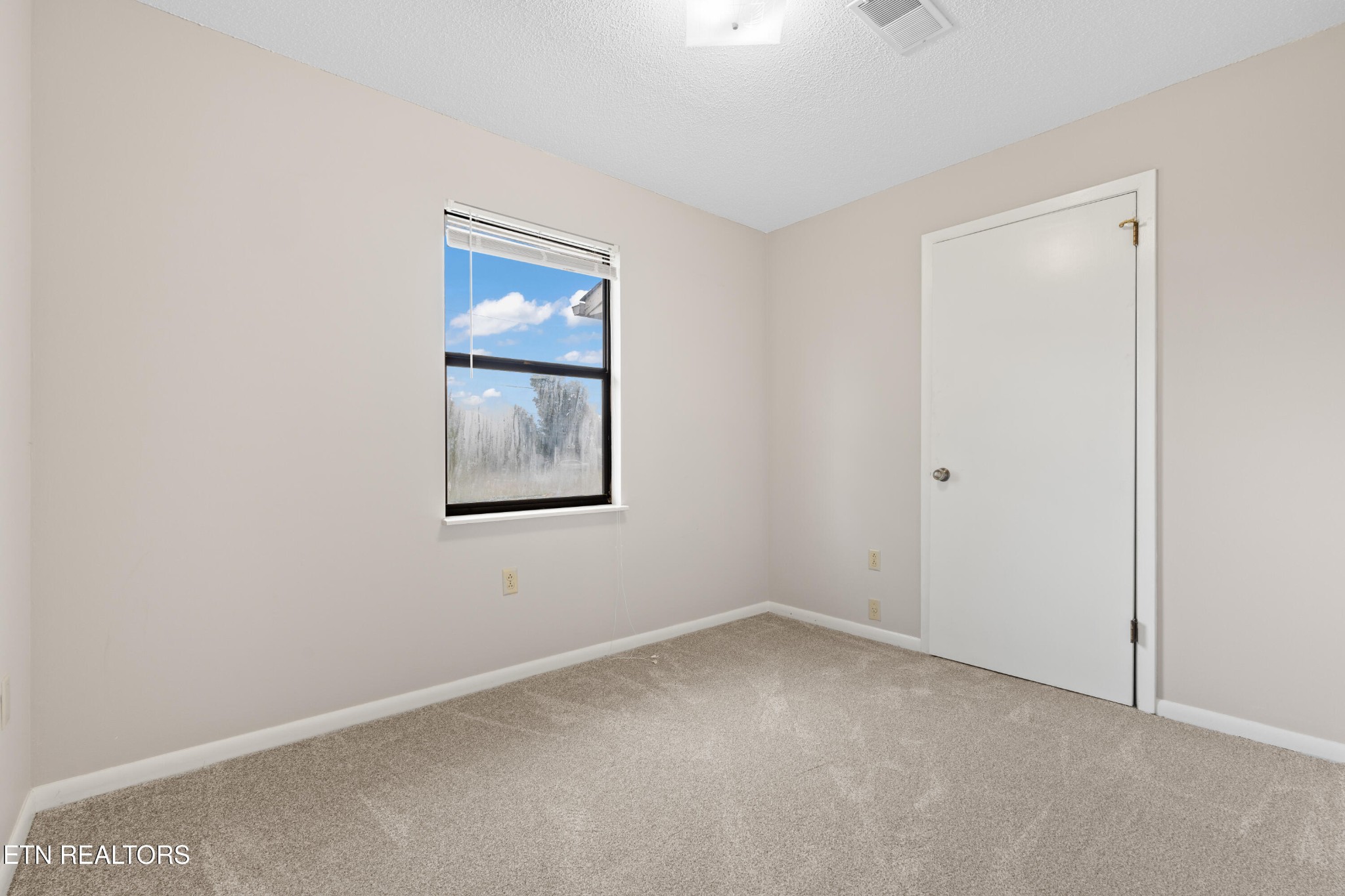 325 Blue Ridge Lane Seymour, TN 37865 - Photo 13 of 27 an empty room with a window