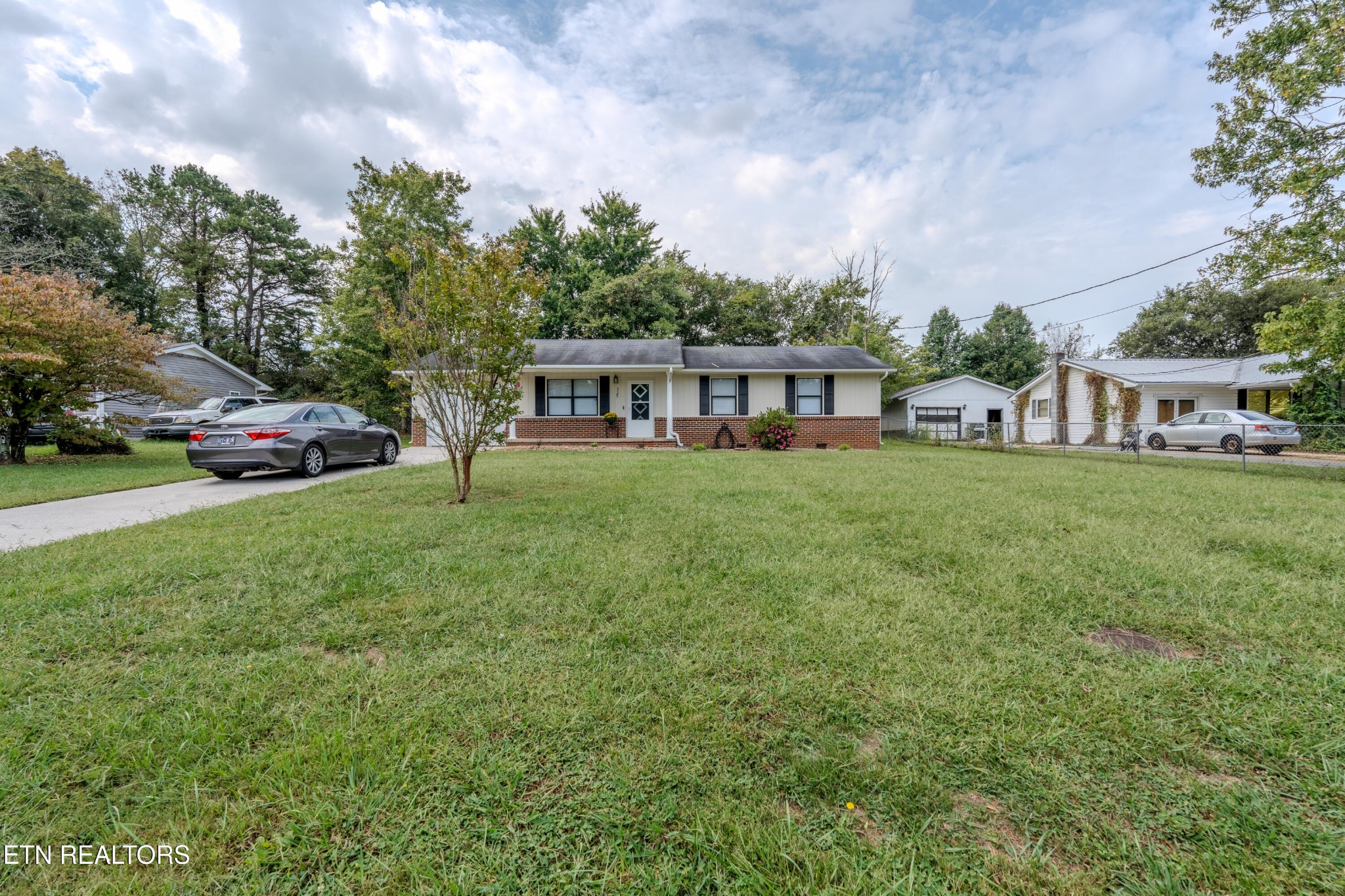 325 Blue Ridge Lane Seymour, TN 37865 - Photo 4 of 27 a view of a house with a yard and sitting area