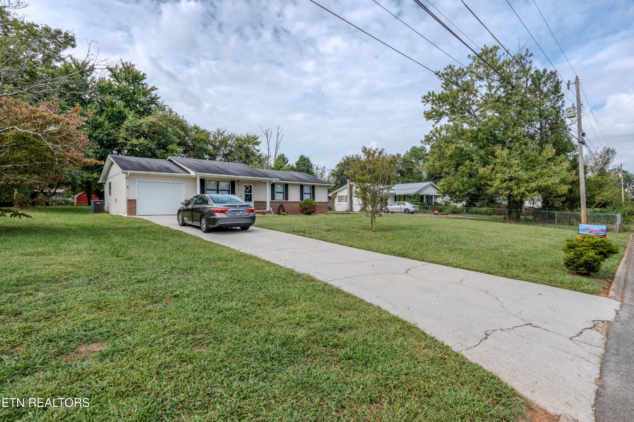 325 Blue Ridge Lane Seymour, TN 37865 - Photo 5 of 27 a view of a house with a big yard and large trees