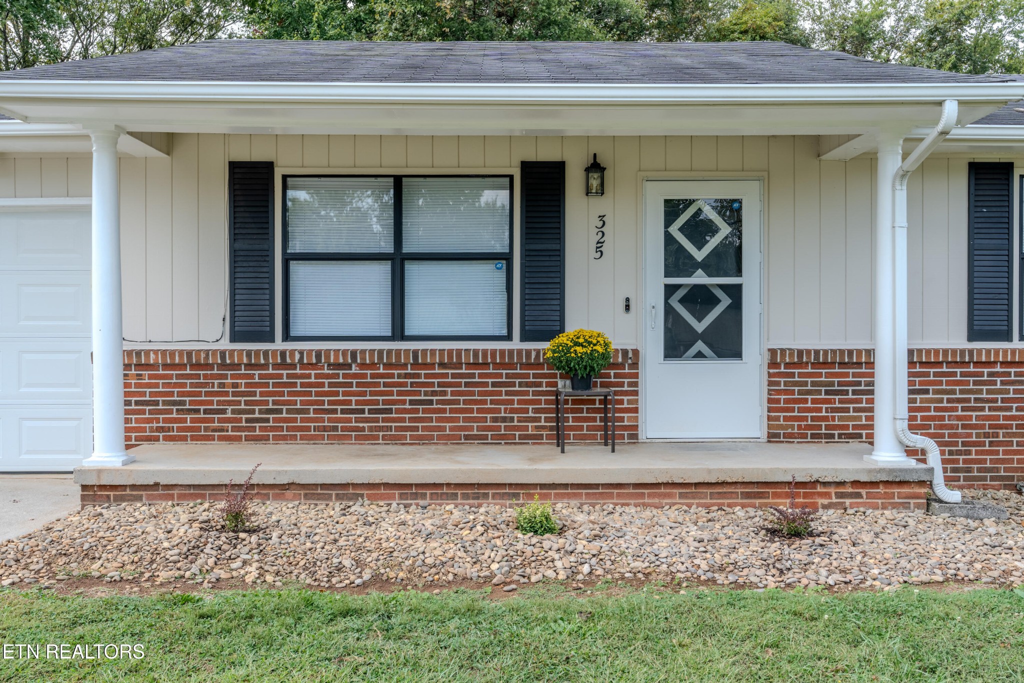 325 Blue Ridge Lane Seymour, TN 37865 - Photo 6 of 27 a front view of a house with a yard