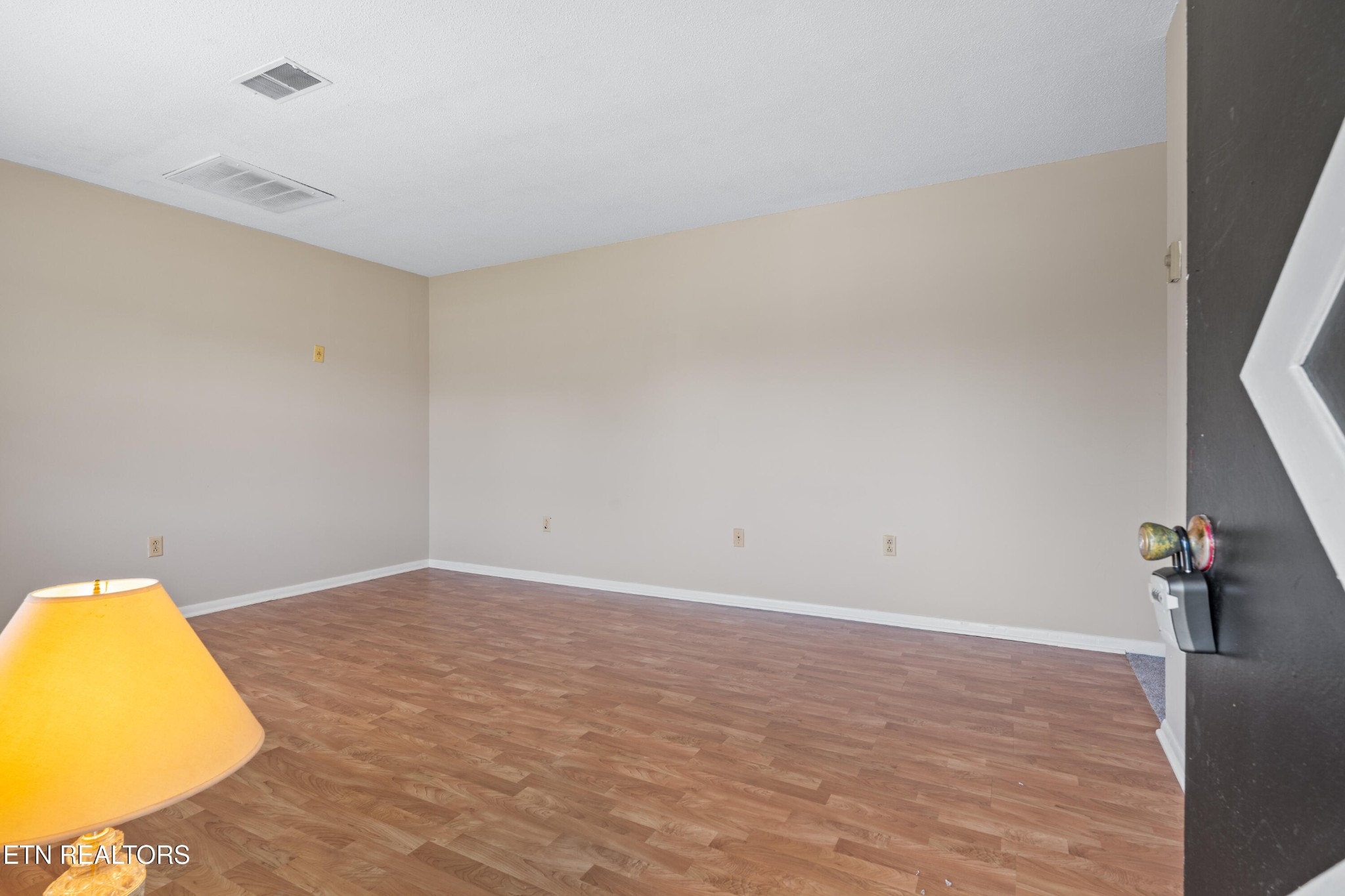 325 Blue Ridge Lane Seymour, TN 37865 - Photo 7 of 27 a view of a room with wooden floor and cabinet