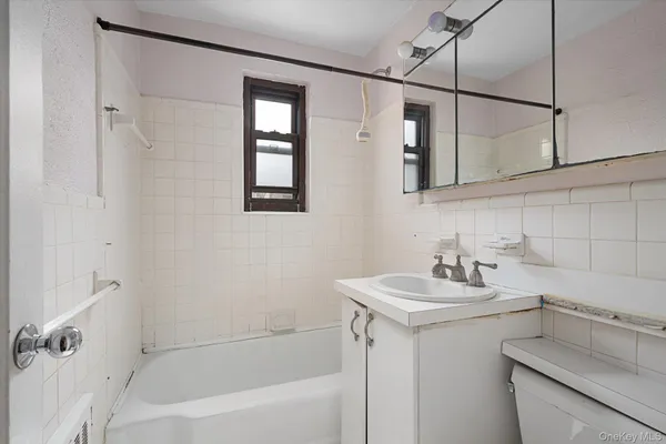 a bathroom with a sink and a bathtub