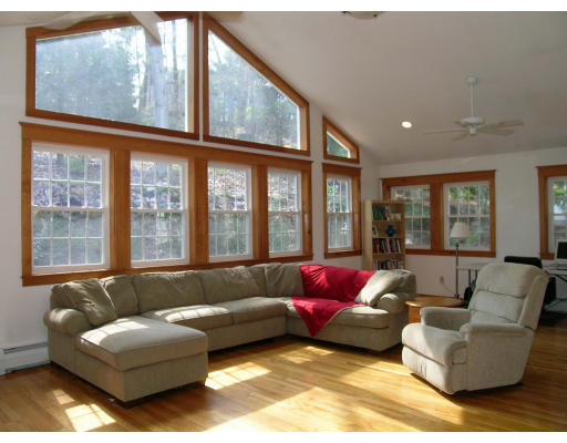 548 South Border Road Winchester, MA 01890 - Photo 1 of 1 a living room with furniture and a large window