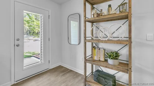 a view of front door with furniture