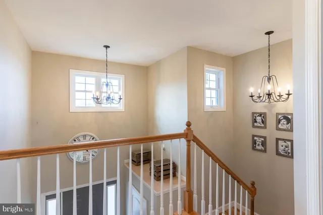 a view of a balcony with wooden floor