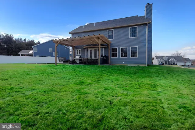 a view of a house with a big yard