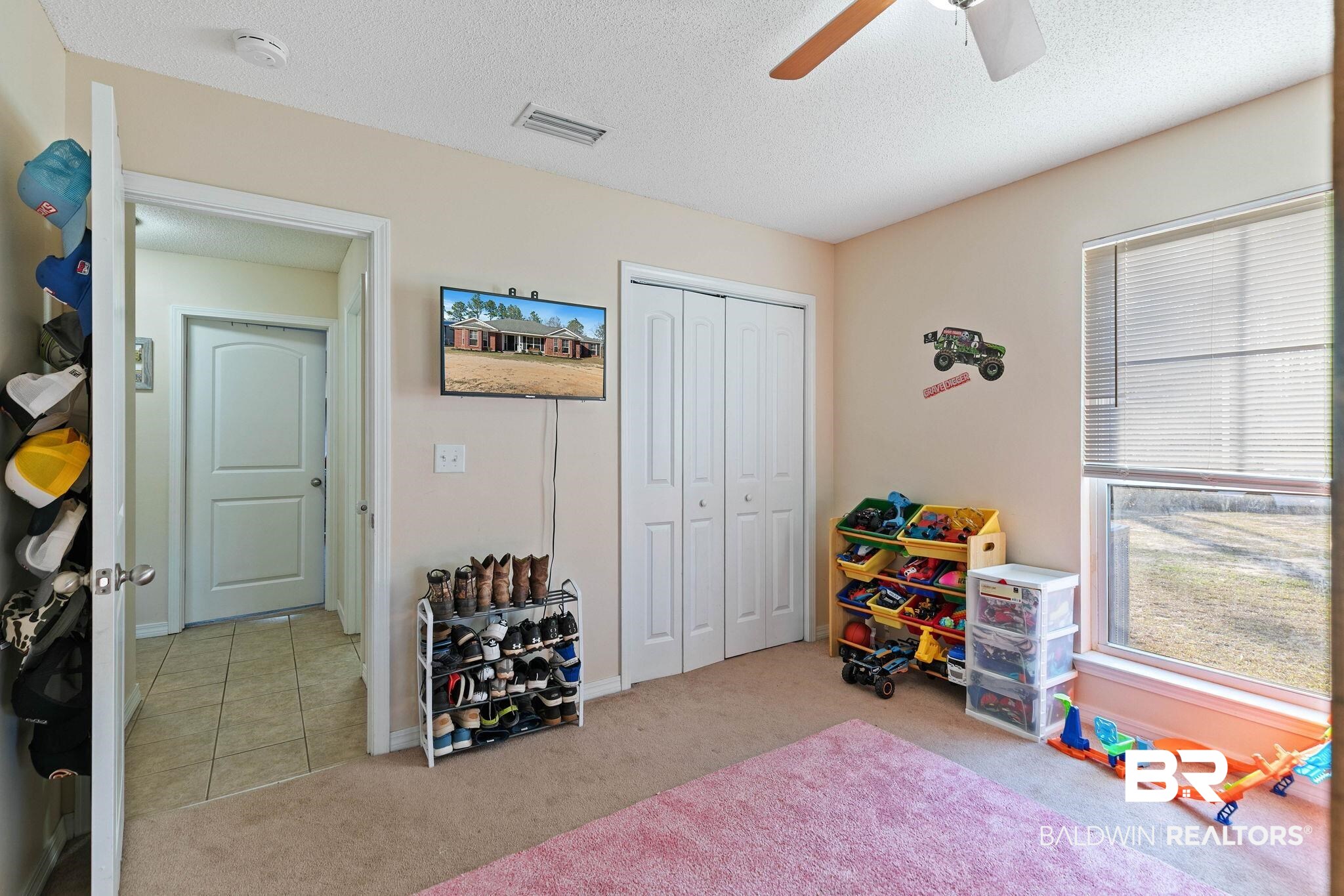 55750 Lottie Road Perdido, AL 36562 - Photo 46 of 84 Rec room featuring light carpet, a textured ceiling, and ceiling fan