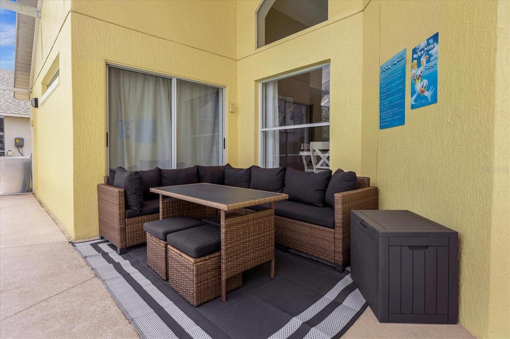 217 Holborn Loop Davenport, FL 33897 - Photo 22 of 23 a living room with furniture and a window