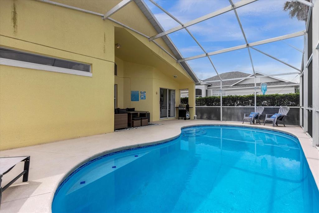 217 Holborn Loop Davenport, FL 33897 - Photo 23 of 23 a view of a room with gym equipment