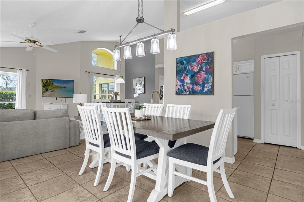 217 Holborn Loop Davenport, FL 33897 - Photo 7 of 23 a dining room with furniture and window
