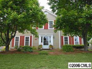 10345 Fairway Ridge Road Charlotte, NC 28277 - Photo 1 of 8 a front view of a house with a yard and trees
