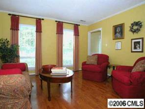 10345 Fairway Ridge Road Charlotte, NC 28277 - Photo 2 of 8 a view of a livingroom with furniture and a couch