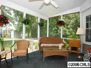 10345 Fairway Ridge Road Charlotte, NC 28277 - Photo 6 of 8 a outdoor living space with furniture and garden view