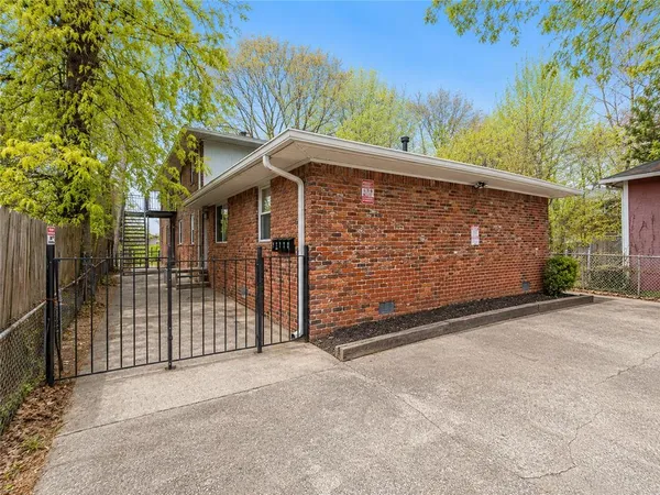 a front view of a house with a garage