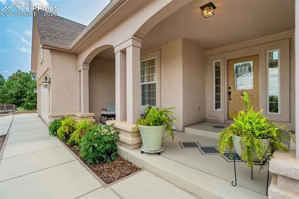 a view of a entryway door front of house