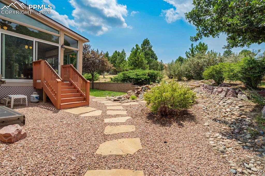 4618 Bethany Court Colorado Springs, CO 80918 - Photo 41 of 50 a view of a chair and table in backyard of the house