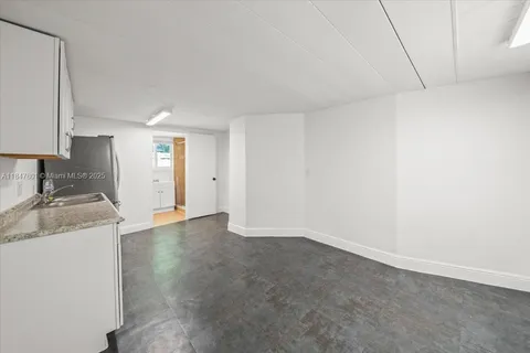 a view of a kitchen and a sink