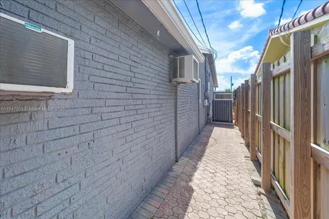 a view of a pathway with a house