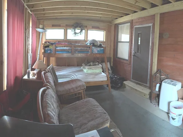 a room with furniture and a window