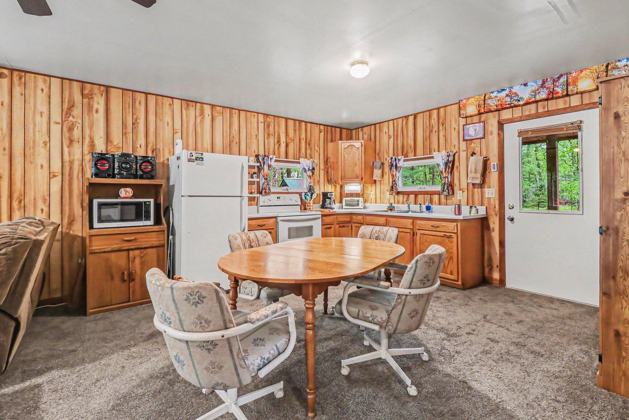 4616 Chalker Road Wellston, MI 49689 - Photo 5 of 23 Dining Room & Kitchen
