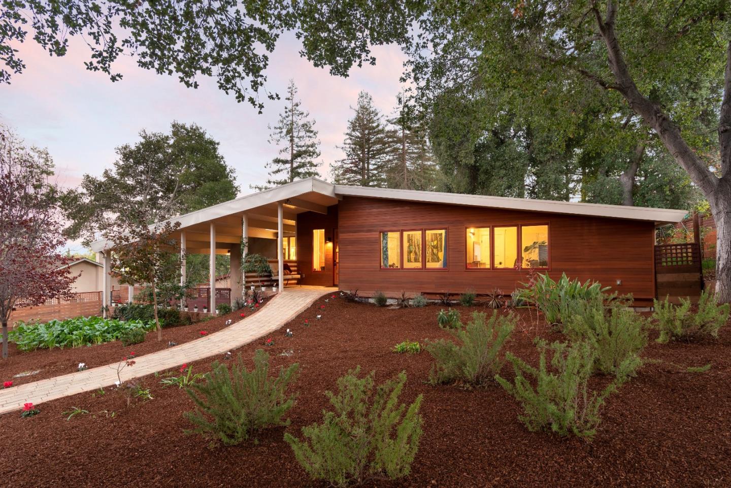 20830 Boyce Lane Saratoga, CA 95070 - Photo 1 of 1 a front view of a house with garden