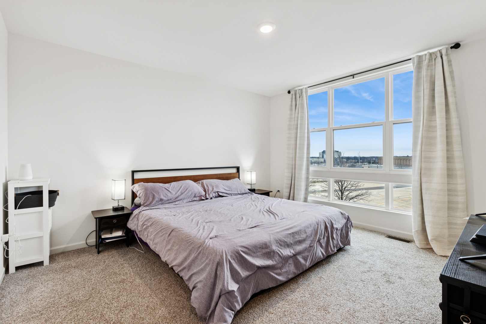 306 Summit Circle Lombard, IL 60148 - Photo 17 of 23 a bedroom with a bed and a large window